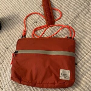 Lululemon orange crossbody bag